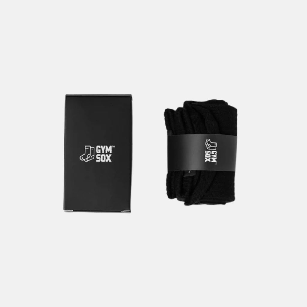 Black gym socks with packaging on a white background