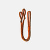 Orange and black resistance band on a light gray background