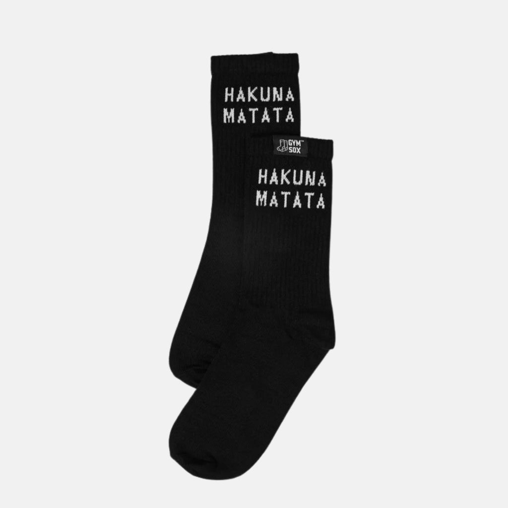 Black socks with 'Hakuna Matata' text on a light gray background