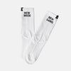 White socks with 'New Week' and 'New Gains' text on a white background