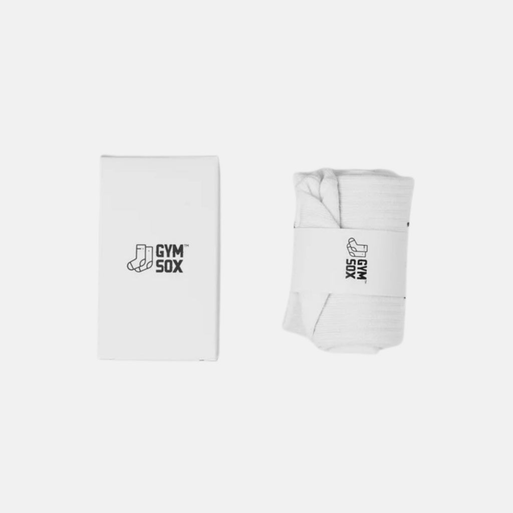Two pairs of white compression socks with 'Gym Sox' branding on a light gray background