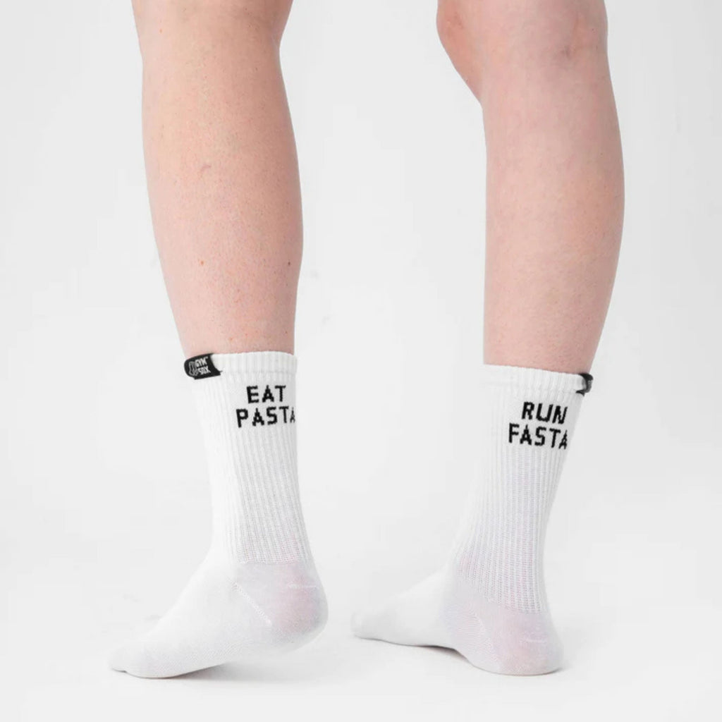 White socks with text worn by a person on a white background