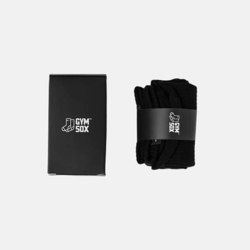 Black gym socks with a branded box on a light gray background