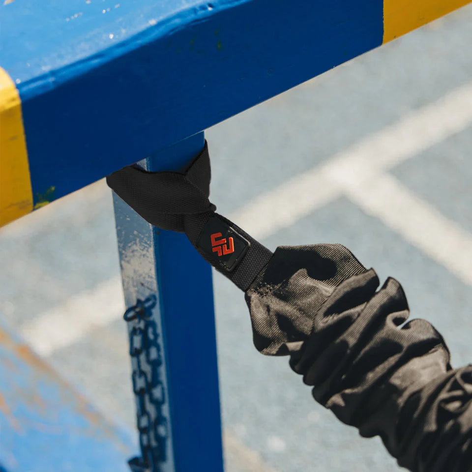 Black band holding onto a blue and yellow structure