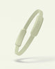 Light green silicone bala pilates circle on a white background