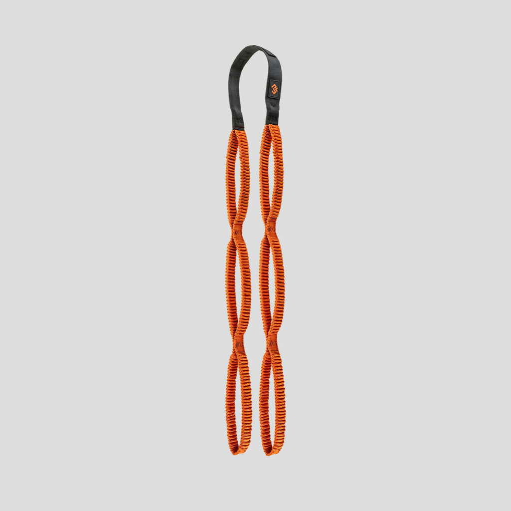 Orange resistance band with black carabiner on a light gray background