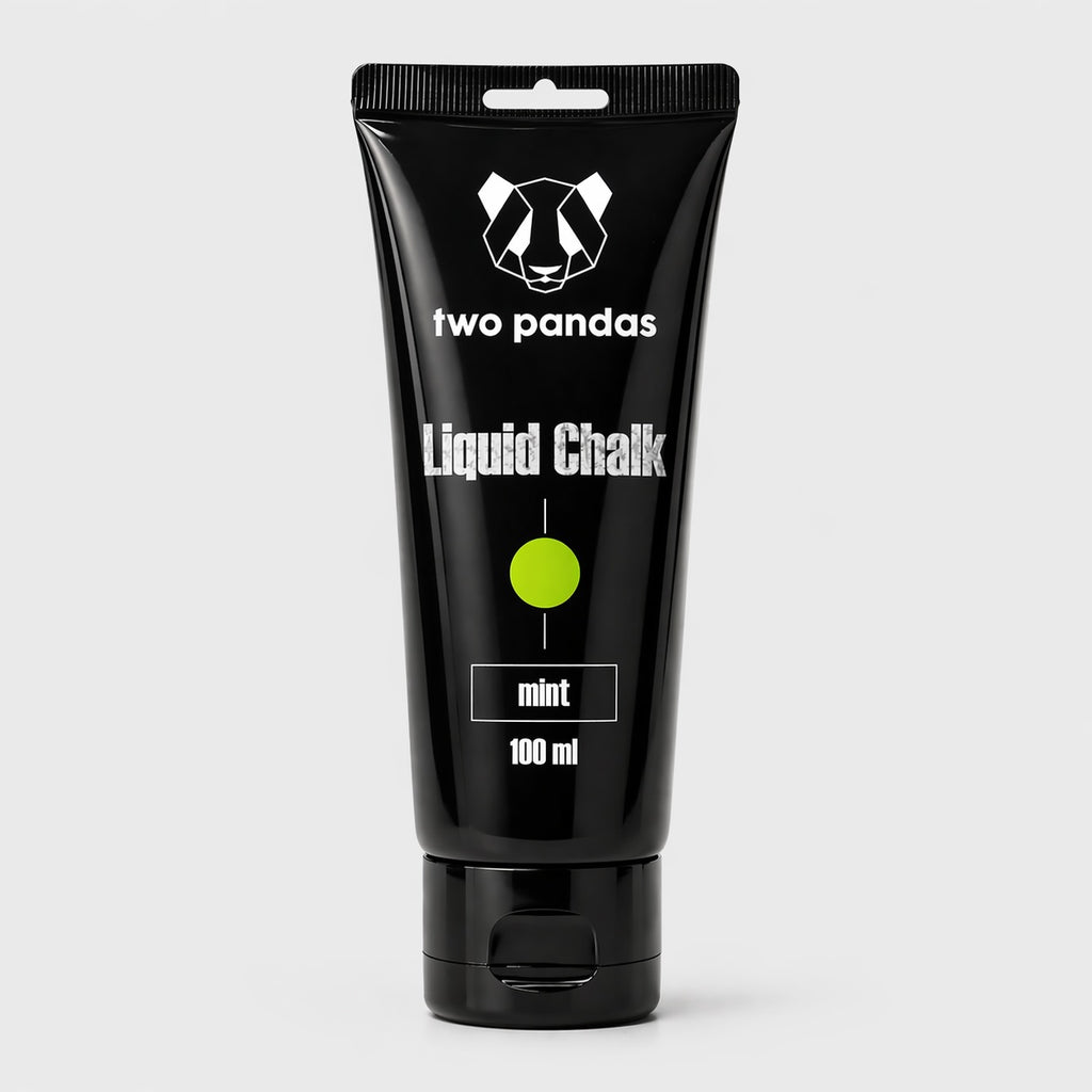 Black tube of two pandas liquid chalk on a light gray background