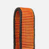 Detail photo of orange fitness band on a light gray background
