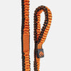Orange resistance band on a light gray background