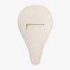 Beige padel bag with gold zipper on a white background
