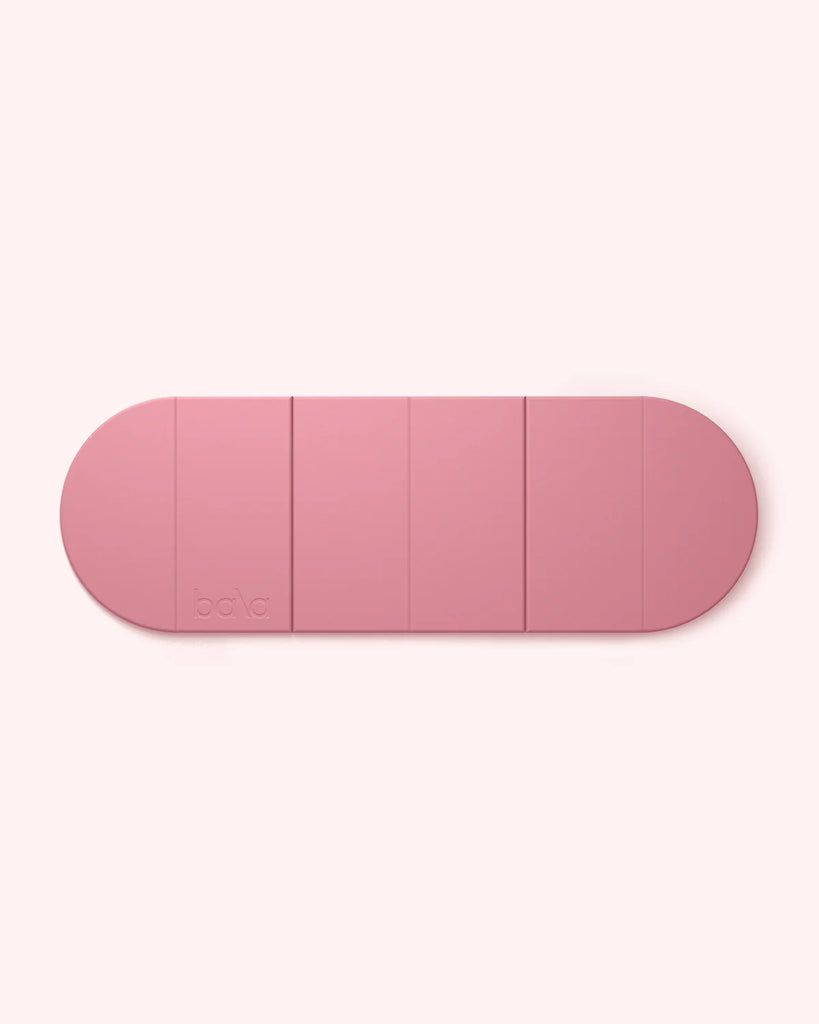Pink Bala Compact yoga mat on white background