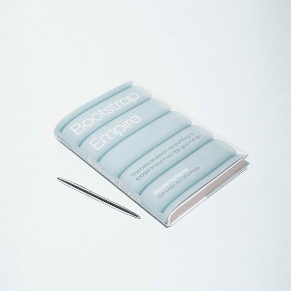 Light blue book titled 'Bootstrap Empire' on a light gray background