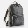 A black leather backpack with a front pocket and visible stitching, displayed against a white background.