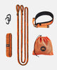 A set of orange resistance bands on grey background