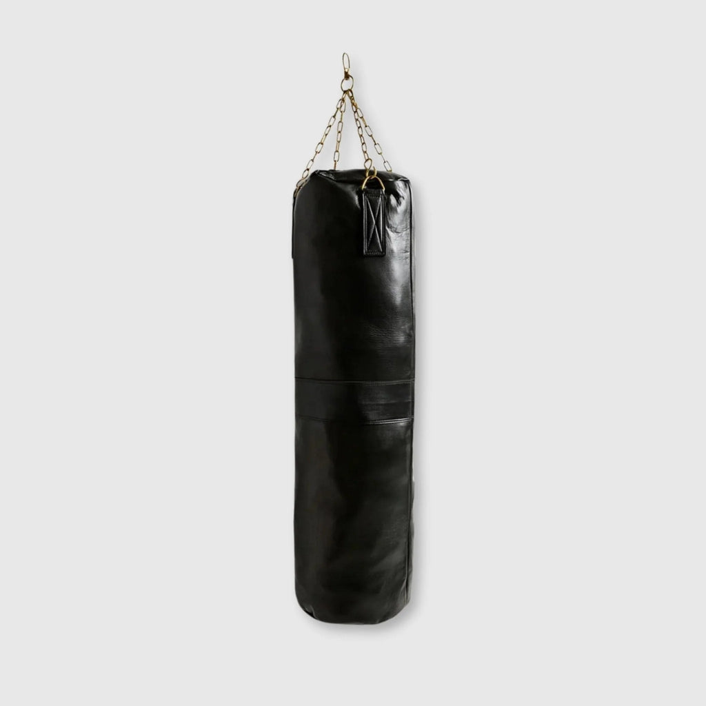 Black punching bag with a chain on a light gray background