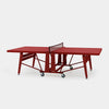 Red ping pong table on a white background