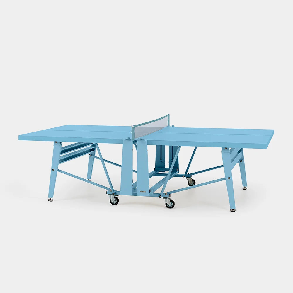 Light blue ping pong table on a white background