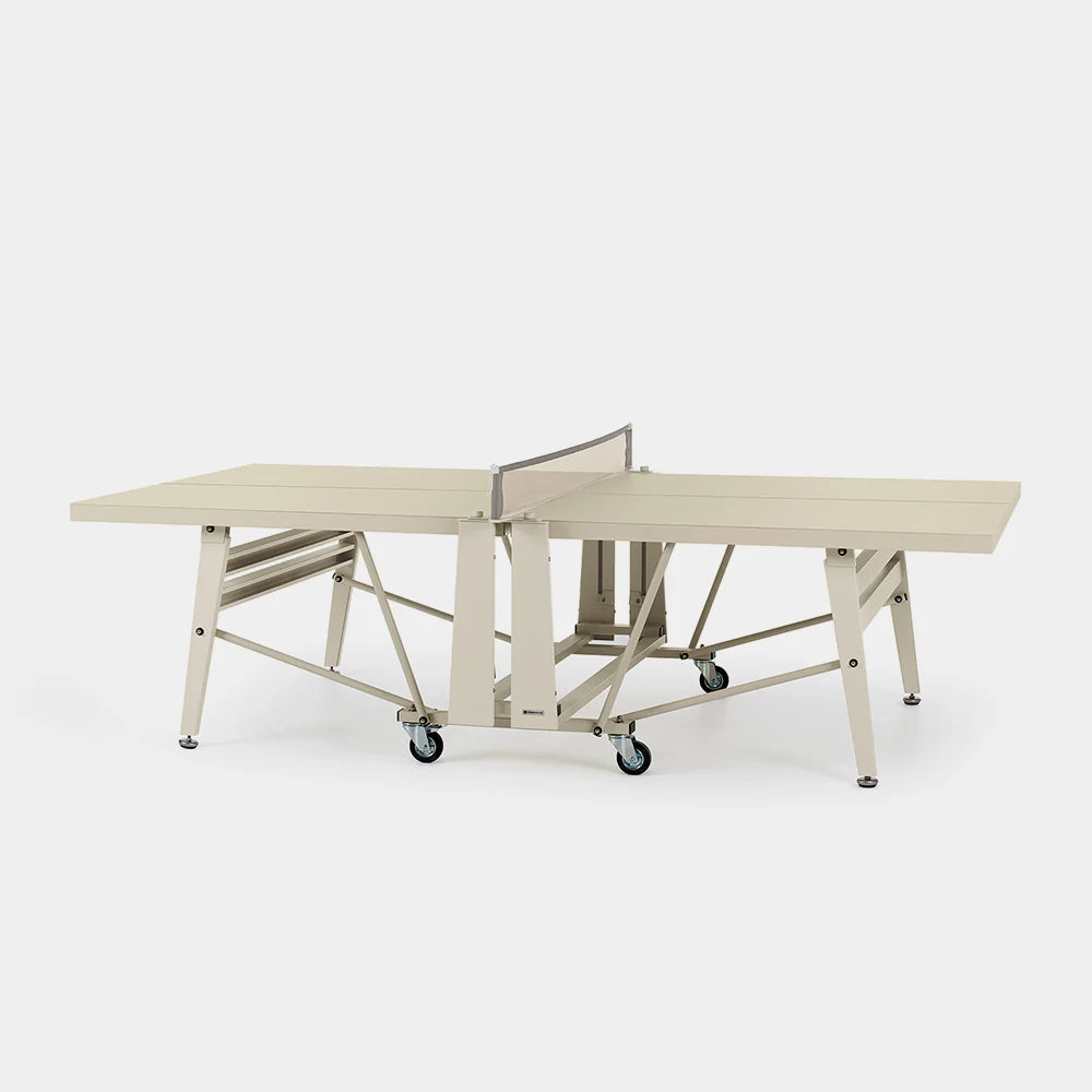 Ping pong table on wheels with a white background