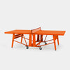 Orange ping pong table on a white background