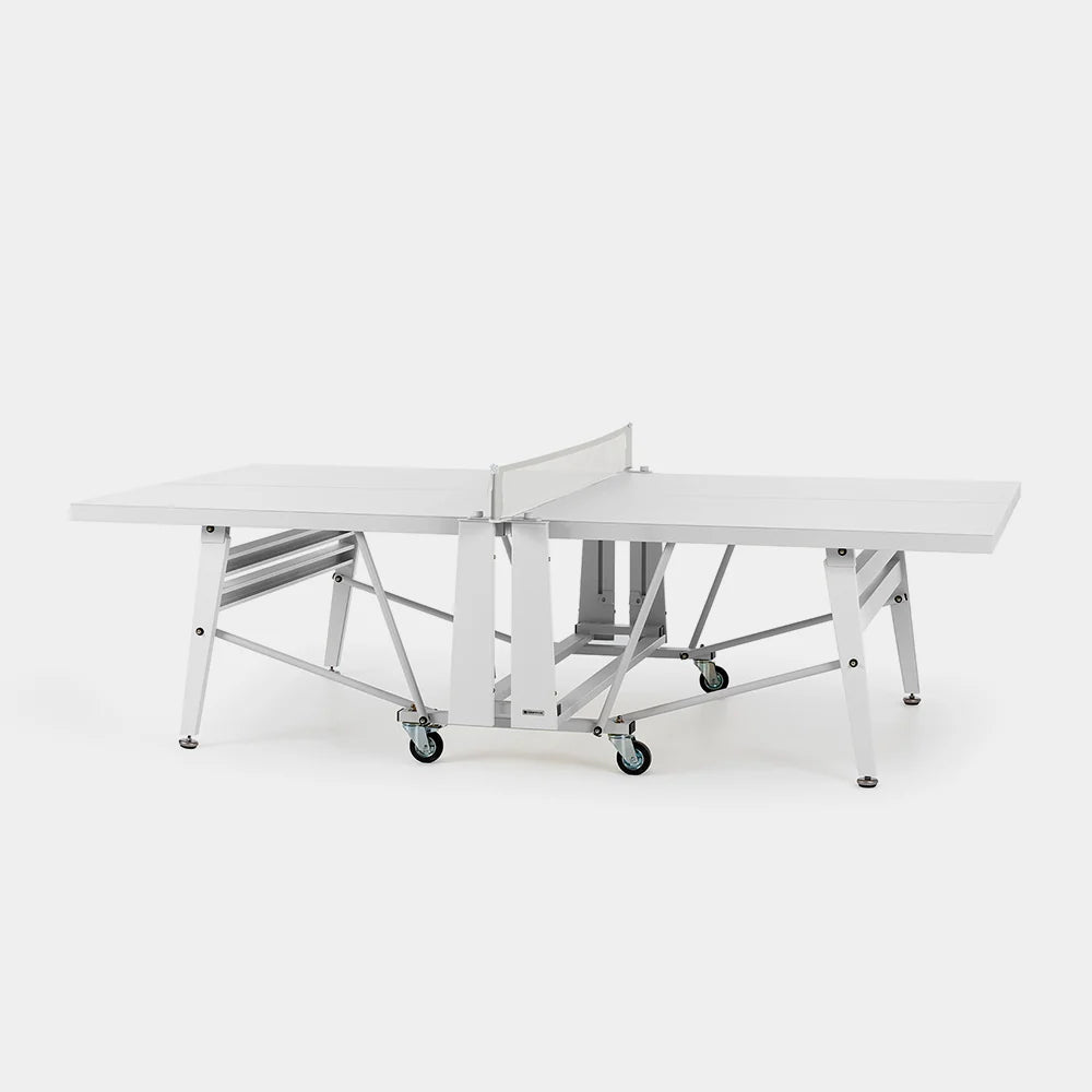 A white and silver convertible ping-pong table shown folded open on a clean white studio background.