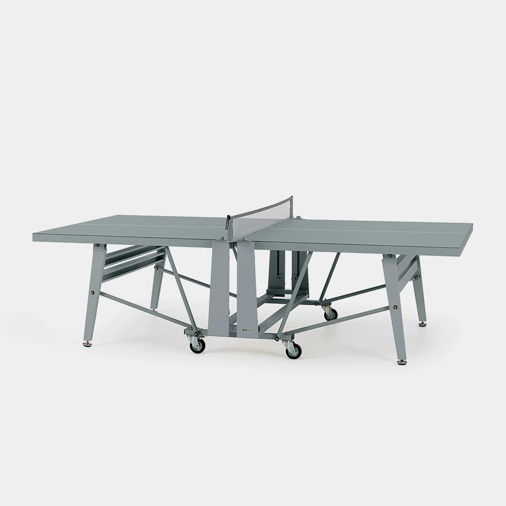 Gray ping pong table on a white background