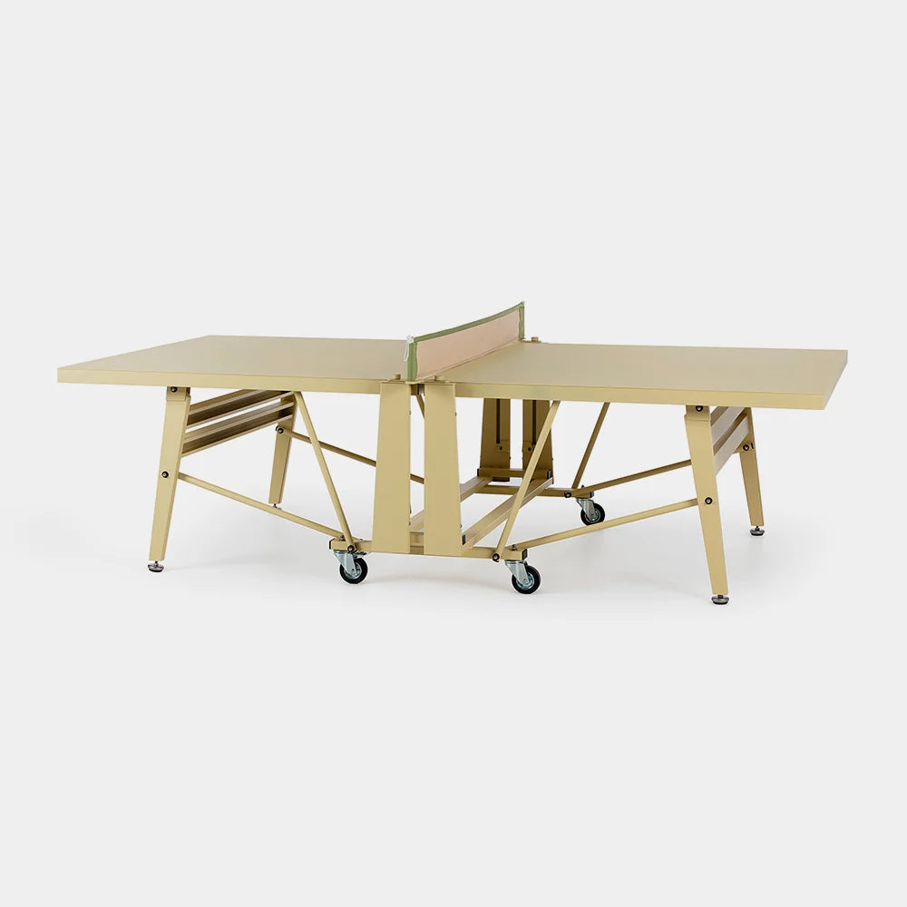 A light wood and gold-finished folding table with a net on wheels, shown on a clean white background.