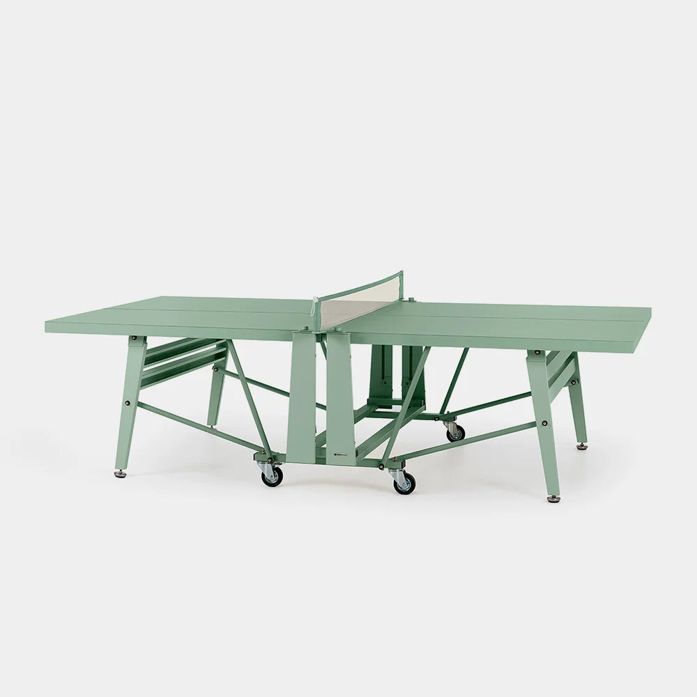 Green ping pong table on a white background