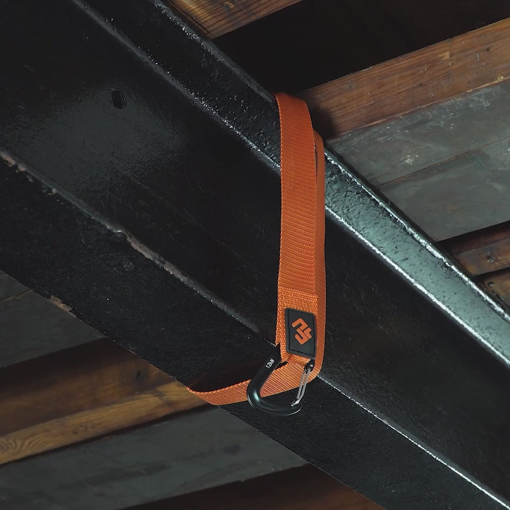 video of man using outdoor anchor strap to exercise